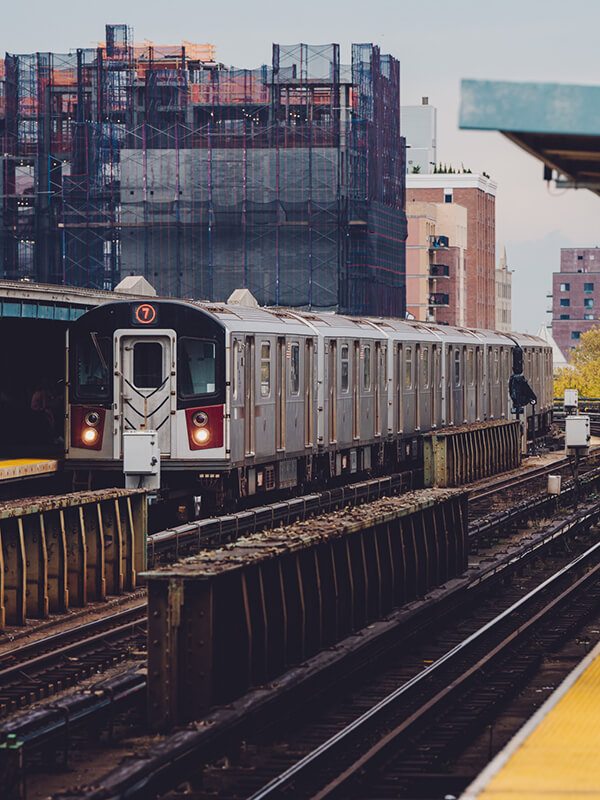 Train going through buildings