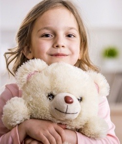 Little girl smiling during children's dentistry visit