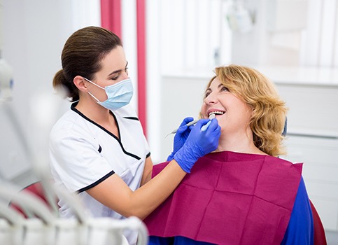 woman during dental checkup in Sunnyside