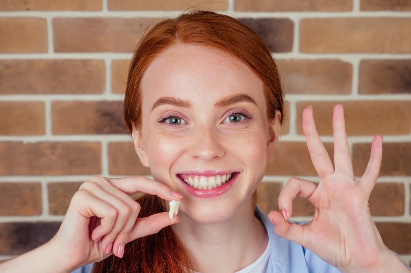 Teen after wisdom tooth removal